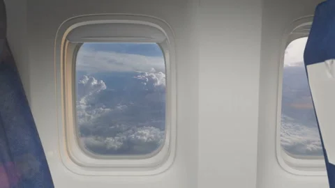 View of the Andes mountain range from an airplane window and Interior Cabin wall 스톡 동영상 344162298