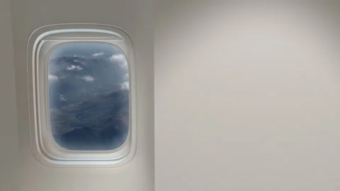View of the Andes mountain range from an airplane window and Interior Cabin wall Stock Footage 344162303