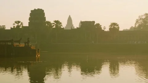View of Angkor Wat temple in early morning in back lighting Stock Footage 88285541