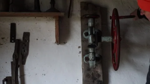 A view of the antique tools in the blacksmith's workshop Stock Footage 297372788