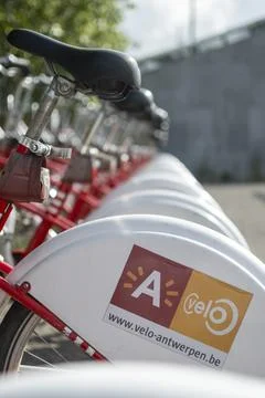 View on Antwerp Velo shared city bikes Stock Photos