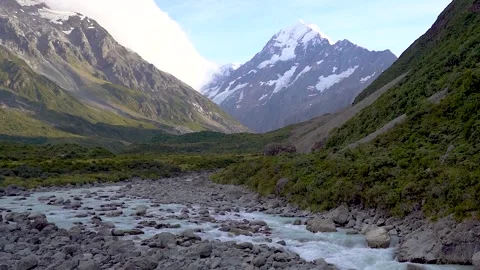 View of Aoraki (Mt Cook) with running stream on the Hooker Valley Track, New Stock Footage 318273801
