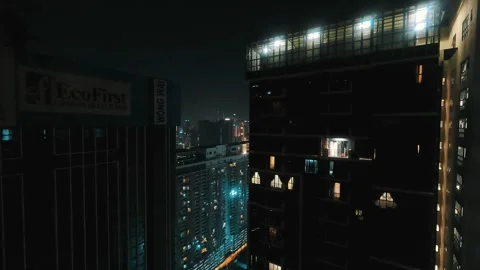 View of the apartment building on the opposite side at night.Lights.Blinking in Stock Footage 341176214