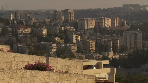 View of apartment buildings at sunset in Jerusalem Stock Footage 86759056