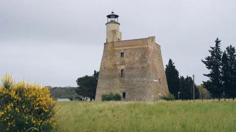 View of the Aragonese Tower or Lighthouse Tower of Scanzano Jonico Stock Footage 241727764