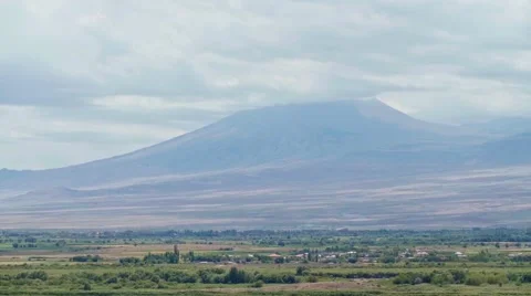 View on Ararat in clouds from Khor Virap monastery on Armenian-Turkey border Stock Footage 65337221