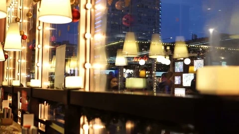 View to Arbat street through the restaurant window, reflections in glass Stock Footage 85049453