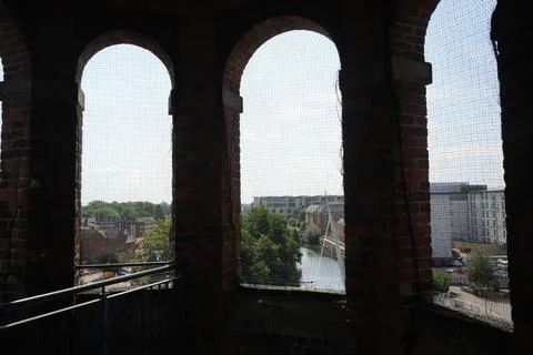 View From Arched Window Overlooking Derby City, England, With River And Stock Photos