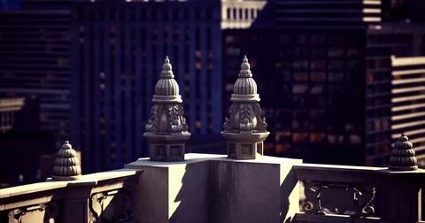 View of architectural features on a historic city building rooftop Ilustración de archivo