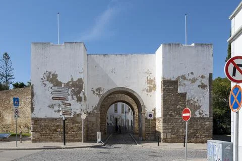 View on the Arco do Repouso, gate to the old town of Faro in Portugal Stock Photos