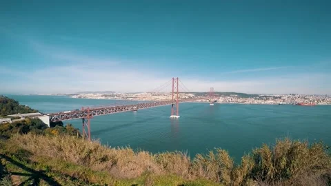 View of the area around the 25 de abril bridge in Lisbon, Portugal Stock Footage 148699198
