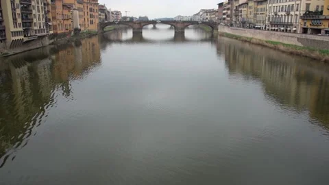 View of the Arno river from the Ponte Vecchio in Florence Tuscany Italy Stock Footage 137956981