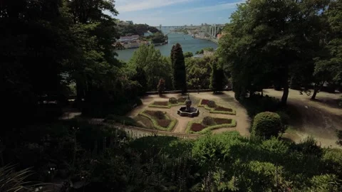 View to Arrbida Bridge over Douro River from a Beautiful Garden in the Park - Stock Footage 154579275