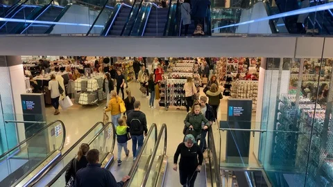 View from ascending escalator with reflection on glass wall and mirror Stock Footage 117792993