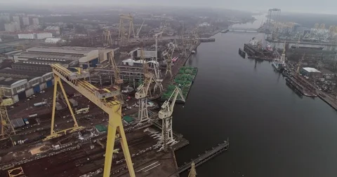 View of assembly plants, cranes and ships on the “Dąbie” lake. Stock Footage 106819461
