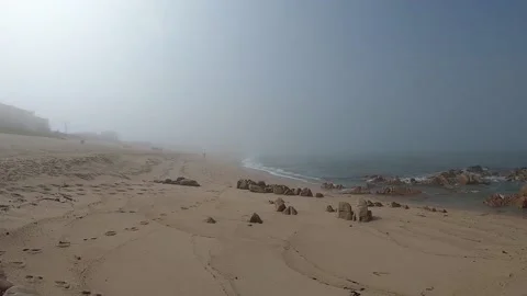 View of the Atlantic Ocean. Empty beach in Povoa de Varzim, Portugal on foggy Video stock 113823833
