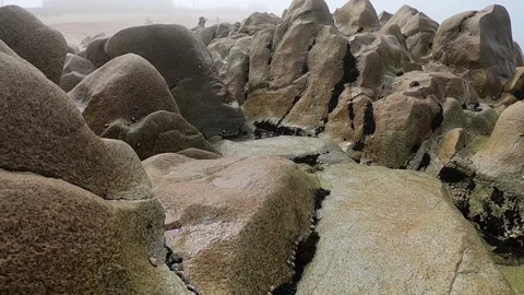 View of the Atlantic Ocean. Empty beach in Povoa de Varzim, Portugal on foggy Stockbeeldmateriaal 114079497