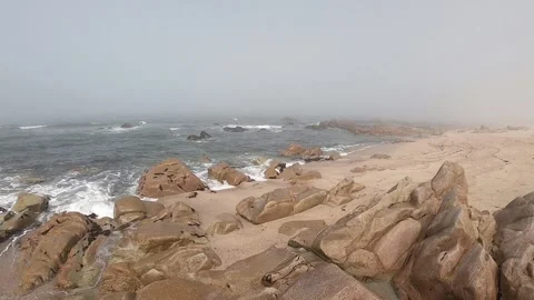 View of the Atlantic Ocean. Empty beach in Povoa de Varzim, Portugal on foggy Stock Footage 114831325