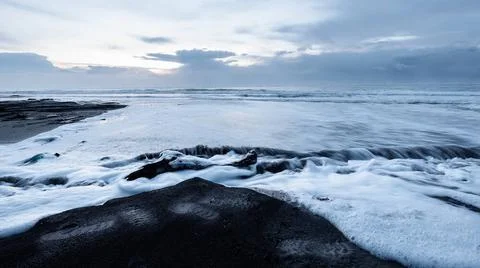 View of the Atlantic ocean with stormclouds and swirl patterns under a dra... Stock Photos
