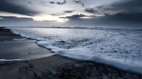 View of the Atlantic ocean with stormclouds and swirl patterns under a dra... Foto stock