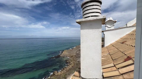 View of the Atlantic Ocean through the window, Portugal Stock Footage 250111035
