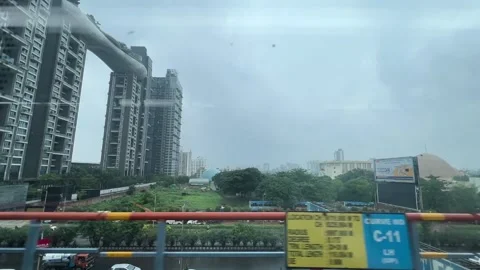 View of Atmosphere building and science city from metro railways in Kolkata Vídeos de archivo 320946129