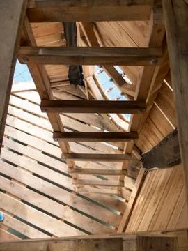 The view from the attic down .Interesting view of the wooden staircase in a.. Stock Photos