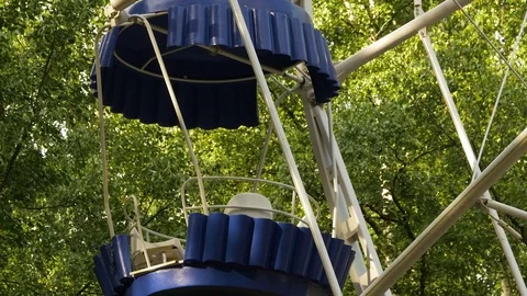 View Of The Attraction Ferris Wheel In Birch Grove Background Timelapse Stock Footage 79561132