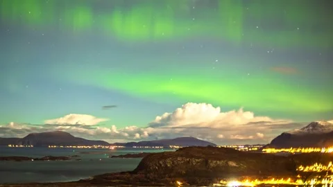 View of aurora borealis over the coastal town of Alesund, Norway. Video stock 340641040