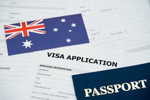 View of Australia visa application form with passport and national flag Stockfoto's