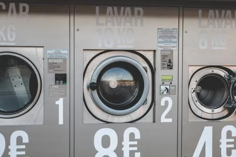 View of an automatic public washing machine in Albufeira, Portugal Stock Photos