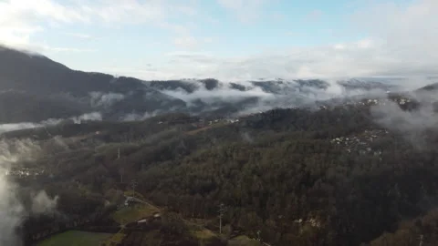 View of the autumn forest in the mountains through the clouds Stock Footage 247087950