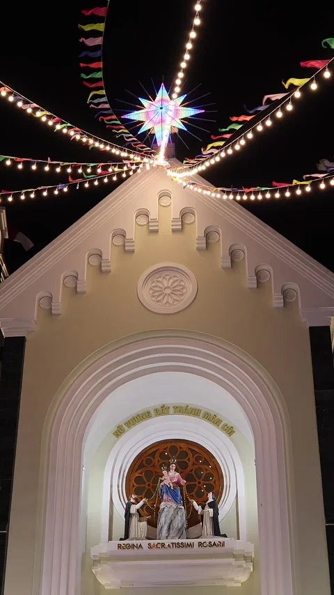 View of Ba Lang catholic church faсade on Christmas Eve, Nha Trang, Vietnam Stock Footage 336664089