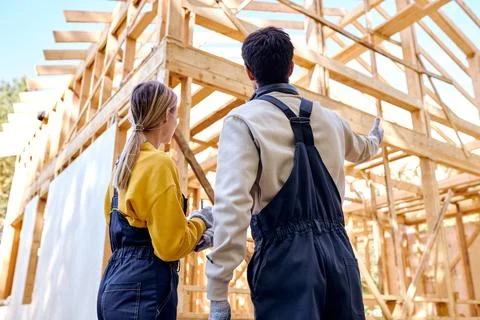 View From Back On Constructors In Working Wear Explore Construction Stock Photos