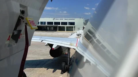 View from back door of airplane parked at kavala airport Video stock 280706680