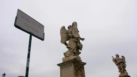 View of the back of a stone statue with an image of an angel with wings. Stock Footage 124415697
