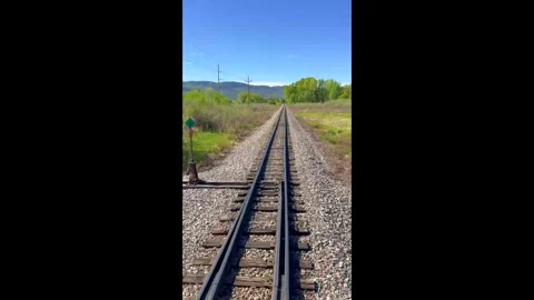 View from the back of a train on the Durango and Silverton narrow gauge railway Stock Footage 320260305