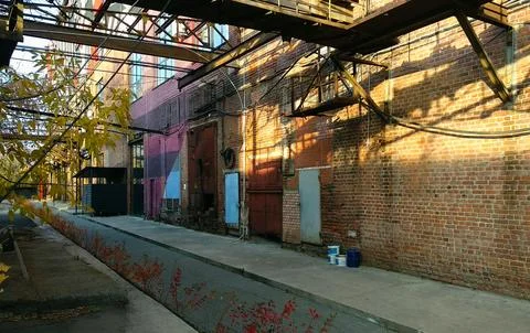 View of the backyard and the facade of the old factory Stock-Fotos