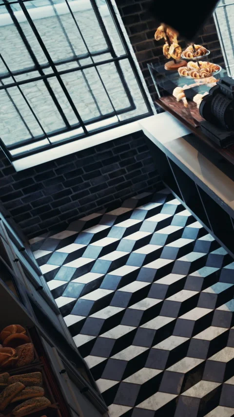 View of a bakery floor with patterned tiles and natural light coming in Stock Footage 335098419