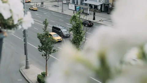 View from the balcony of a multi-lane road with traffic Stock Footage 309497967
