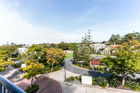 View from the Balcony of Skyline Featuring Trees and Houses Stock Photos