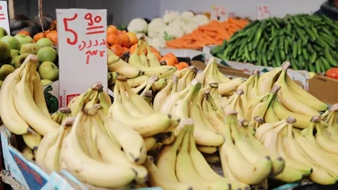 View of bananas, apples, and other fruits in the market. Stickers with price Stock Footage 181648361