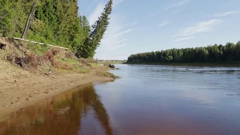 View from the bank of the Siberian river to the village Stock Footage