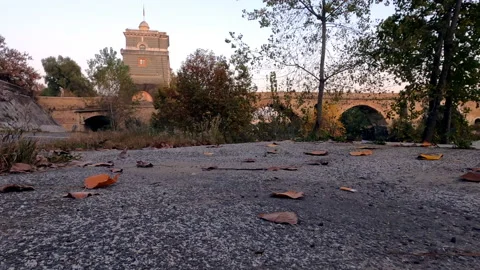 View from the banks of the Tiber River on the background of Milvio Bridge in Stock Footage 142936236
