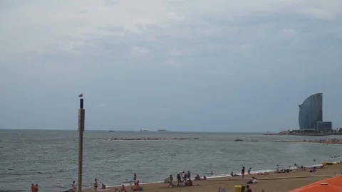 The view of the barceloneta beach durigin a cloudy day Stock Footage 95976592