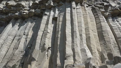 Up view of basalt columns made of volcanic stone Stock Footage 261595207