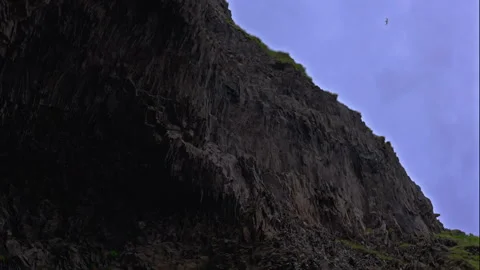 View of basalt rocks and sky at Reynisfjara Beach in Iceland 動画素材 329442732