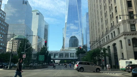 View of the base of the Freedom tower reflecting blue skies in lower Manhattan Stock Footage 248561491