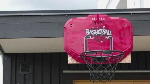 View of basketball practice where ball is thrown into basket with net Video stock 202192351