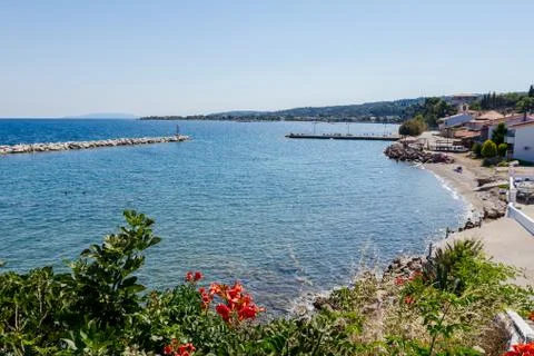 View on the bay with artificial reef, walled seashore against water erosion Stock Photos